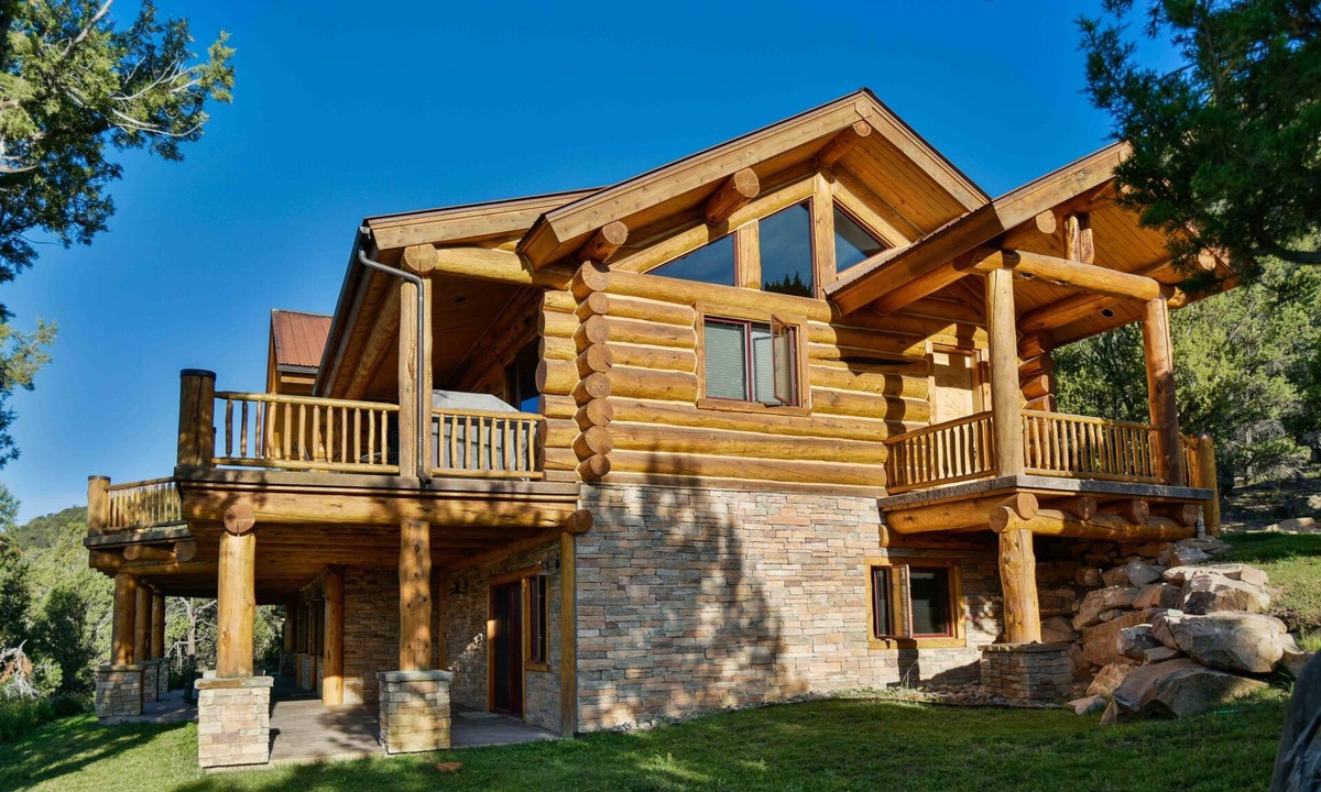 Pleasant Valley House | Breathtaking luxury log home on 44 acres. Two primary suites. STR-1-2024-053.