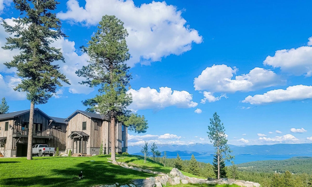 Lakeside House | Gorgeous lake-view cabin with game room & fireplaces - near Blacktail Mountain