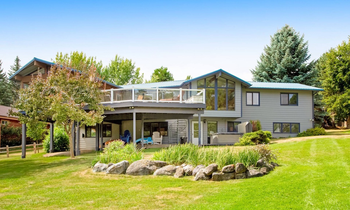 Lakeside House | Lakefront home with dock, lake views, Ping-Pong, outdoor kitchen, private beach