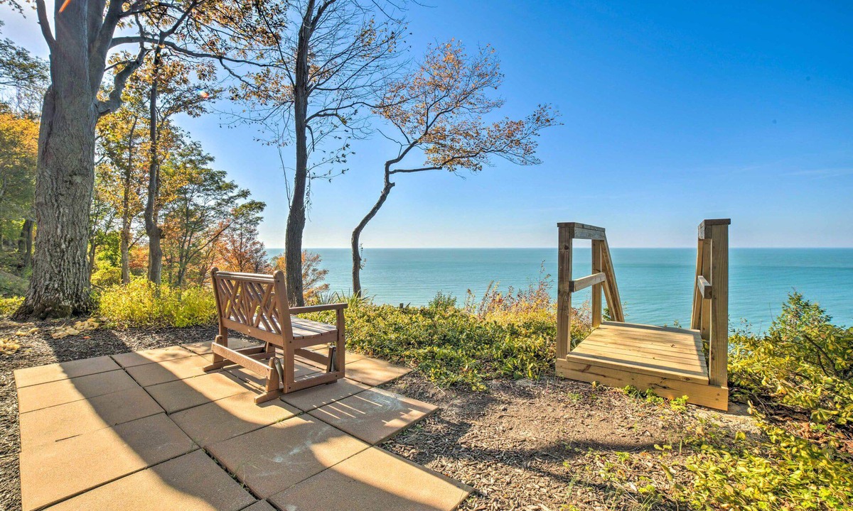 Riverside House | Luxe Waterfront Haven: Private Beach, Hot Tub
