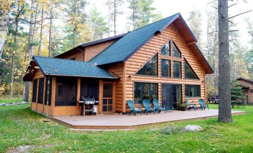 Babbitt House | Spacious Luxury Log Cabin with Stone Fireplace & Screened Porch Near Superior National Forest, Babbitt MN