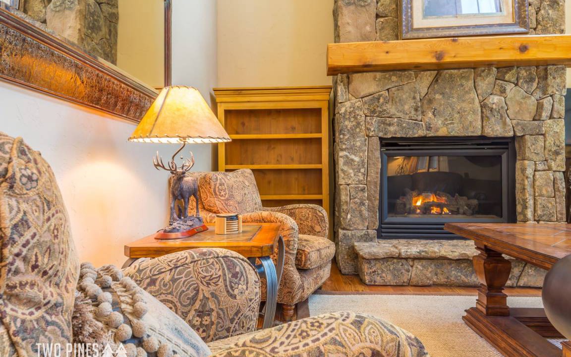 Big Sky House | Trotwood Townhome Cozy up to the Fireplace on a Snowy Night!