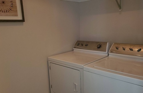 Riverfront House | Hip Strip Suites: Trendy Three Bedroom Townhome