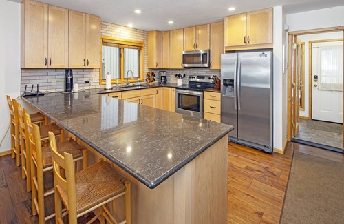 Big Sky Meadow Village Condo | Home on Big Sky Golf Course w/fireplace & community pool/hot tub -The Lone Peak Lookout