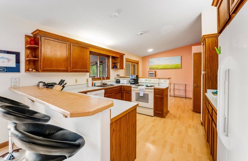 Lakeside House | Lakefront home with dock, lake views, Ping-Pong, outdoor kitchen, private beach