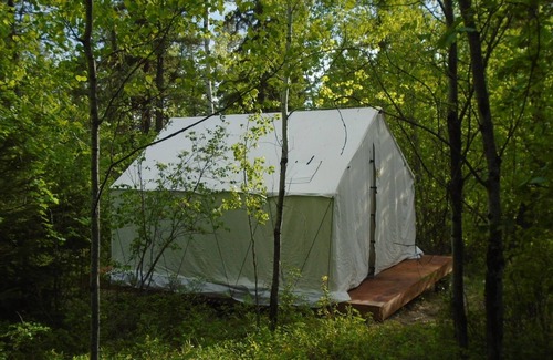 Eureka RV Rental | Mountain Man Wall Tent campsite 5 Caribou Trail Wagon Camp