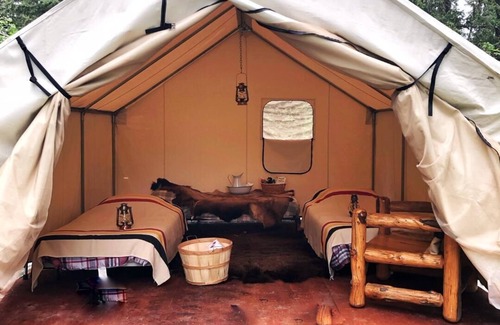 Eureka RV Rental | Mountain Man Wall Tent campsite 5 Caribou Trail Wagon Camp