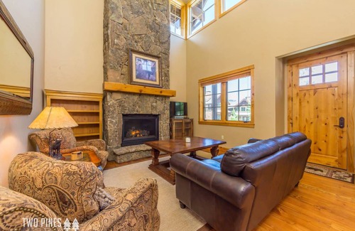 Big Sky House | Trotwood Townhome Cozy up to the Fireplace on a Snowy Night!
