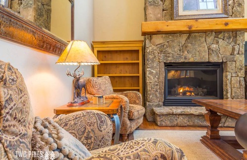 Big Sky House | Trotwood Townhome Cozy up to the Fireplace on a Snowy Night!