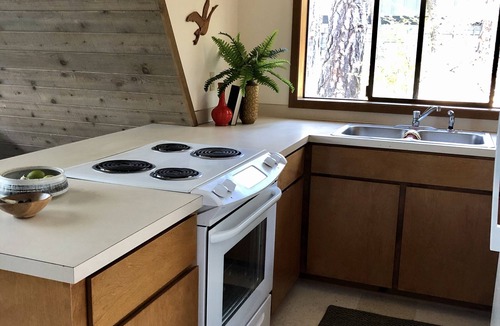 Hayden Lake Cabin | All day sun! Lakefront A-Frame cabin, private dock, sunset views, pet friendly.