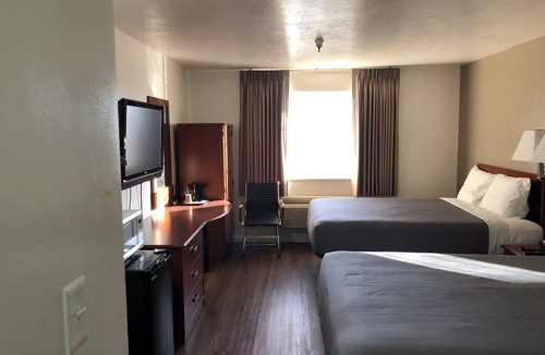 Sunset Hotel | Ameri-Stay Inn & Suites