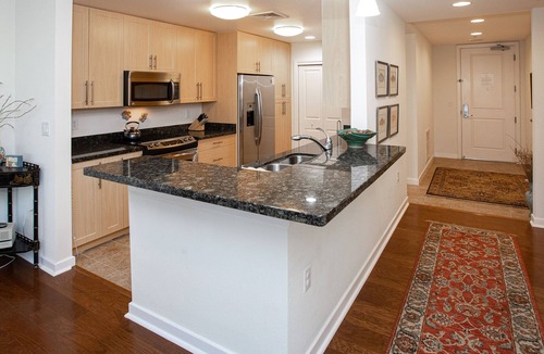 Sandbridge Condo | Beautiful bayside 2nd-floor condo with parking, 3 outdoor pools, gym, & AC