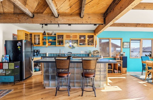 Dayton House | Beautiful & unique home with large windows and deck that overlook Flathead Lake