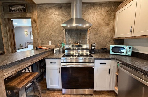 Whitefish House | Bison Ridge Cabin #1 | 4BR Getaway w/Hot Tub, Fire Pit & Grill | Sleeps 8!