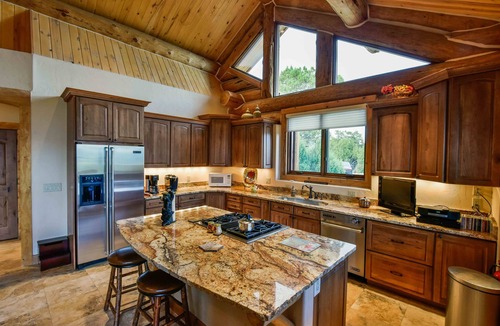Pleasant Valley House | Breathtaking luxury log home on 44 acres. Two primary suites. STR-1-2024-053.