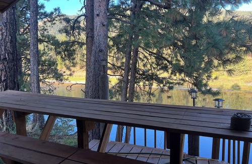 Riverbend Cabin | Cabin, river access, rafts, 1 bedroom and Wi-Fi, AC, Satellite T.V., Kitchen.