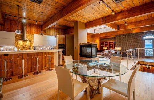 Cody Apartment | Clearwater Penthouse- Couples Retreat with gas fireplace, balcony, spa like bathroom