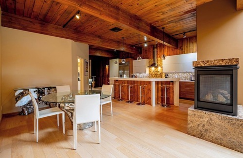 Cody Apartment | Clearwater Penthouse- Couples Retreat with gas fireplace, balcony, spa like bathroom