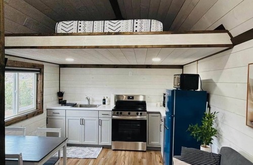 Plains House | Coyote Ridge Hideaway. Wood fired hot tub.