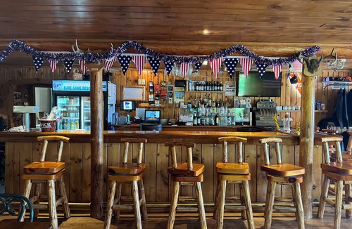 Itasca County Resort | Cozy cabin on lakeside with free dock space and amazing swimming beach
