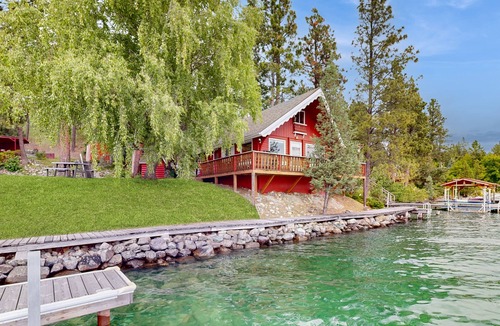 Rollins Cabin | Cozy lakefront log cabin with lake views, vintage decor, & dock