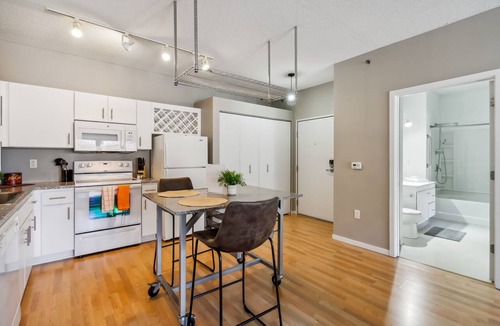 Mill District Apartment | CozySuites Mill District with pool, gym #11