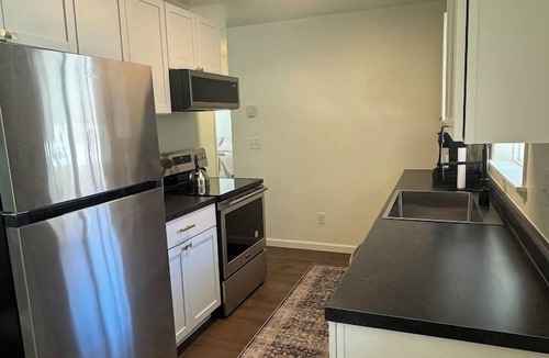 Williston Apartment | Downtown 2BR - Fast WiFi-Easy Parking -Self Check-in