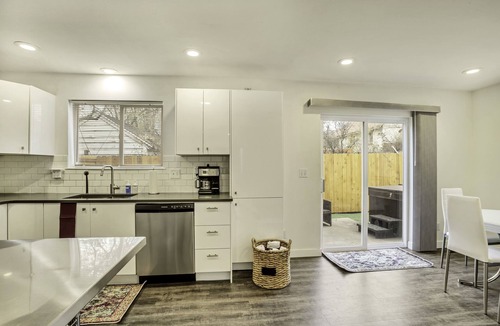 Millcreek House | Exclusive use hot tub with fenced yard!