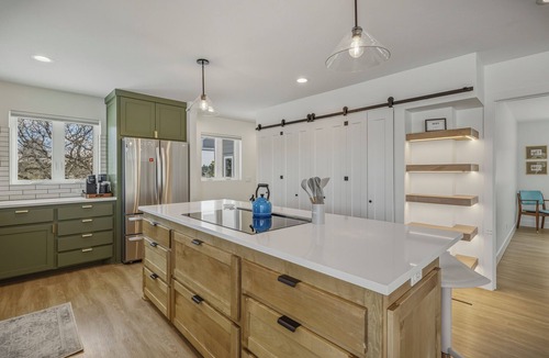 Timber Ridge Ranch House | Expansive home that sleeps up to 7 on 5 acres with stunning mountain views, chef's kitchen, hot tub, entertainment room, 2 car garage, and 2 Fireplaces.
