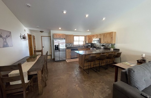 Red Lodge Condo | Family sized cozy cabin with yard to play & hot tub- 5 min to town!