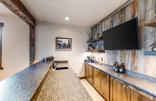 Lakeside House | Gorgeous lake-view cabin with game room & fireplaces - near Blacktail Mountain