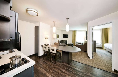 Golden Hotel | Indulge in Home-Like Comfort! Two Units, Full Kitchen, Pet-friendly Property!