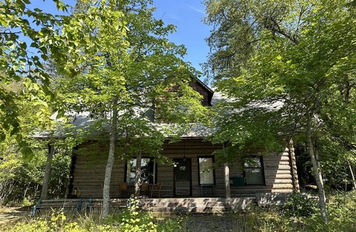 West Glacier Cottage | Inside Glacier National Park, Walsh Cottage on the shores of Lake McDonald
