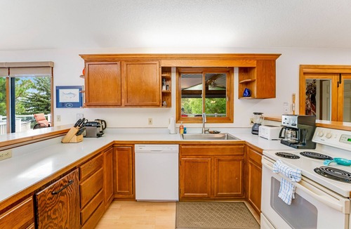 Lakeside House | Lakefront home with dock, lake views, Ping-Pong, outdoor kitchen, private beach