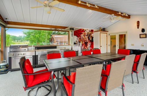 Lakeside House | Lakefront home with dock, lake views, Ping-Pong, outdoor kitchen, private beach