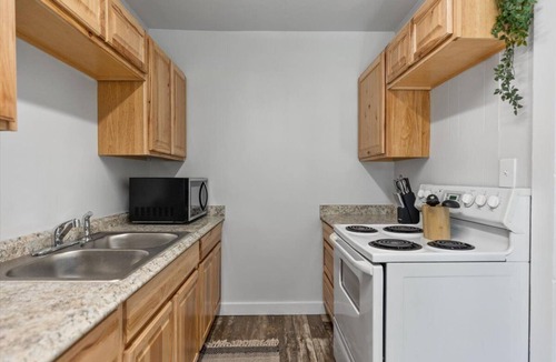 Central - Terry Apartment | Lovely 1BR Hideaway: Fully Furnished, Unit 216