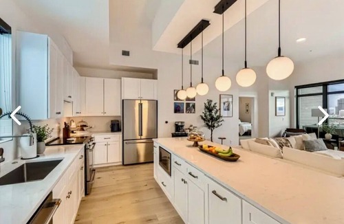 River North Art District Apartment | Luxury penthouse in enchanting Denver with bar, gym, pool, sauna & more