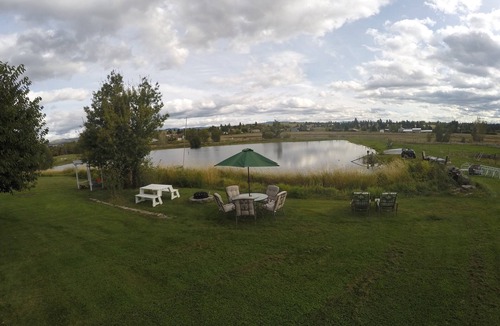 Florence House | Montana Mountain Memories- RV in Orchard by Trout Pond