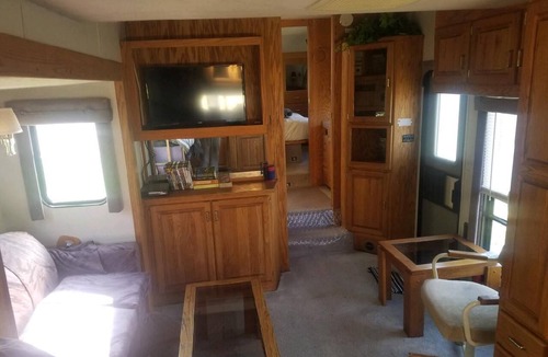 Florence House | Montana Mountain Memories- RV in Orchard by Trout Pond