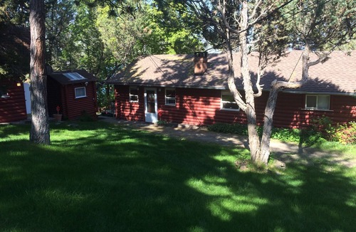 Proctor House | Moose Lodge Rustic Log Home Includes Two Boat Slip Dock with 2 guest cabins