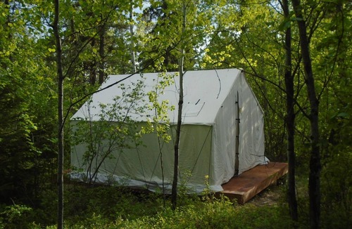 Eureka RV Rental | Mountain Man Wall Tent campsite 5 Caribou Trail Wagon Camp