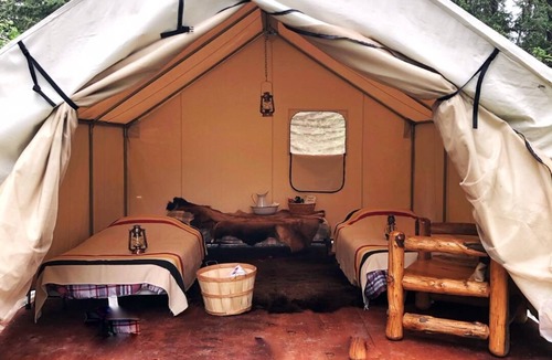 Eureka RV Rental | Mountain Man Wall Tent campsite 5 Caribou Trail Wagon Camp