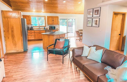Thompson Falls House | Picturesque Riverfront Getaway with Striking Views