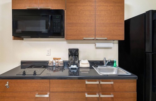 West Valley City Hotel | Relax in a Room with Kitchen Close to Salt Lake Attractions! Pets Allowed!
