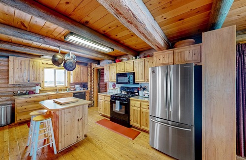 Driggs House | Rustic dog-friendly mountain-view home with fireplace, grill, & Ping-Pong