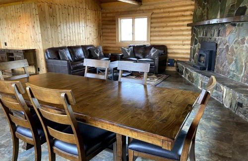 Ennis House | Scenic Vacation Home with Wrap-Around Deck Overlooking Ennis Lake near McAllister, Montana