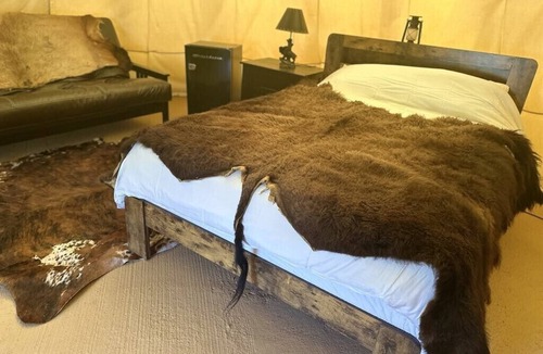 Cameron Cabin | Sheep Creek Ranch Buffalo Luxury Glamping Tipi