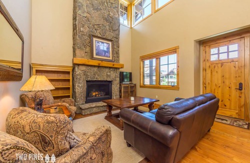 Big Sky House | Trotwood Townhome Cozy up to the Fireplace on a Snowy Night!