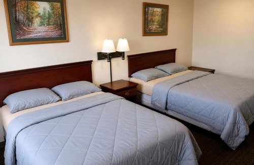 Alexander Hotel | Tumbleweed Inn & Suites