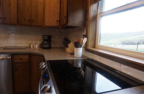 Glacier Country Cabin | Upscale cabin, 10000 acre cattle ranch. Views, abundant wildlife & hiking.